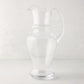 Clear, hand-blown Sutton Glass Pitcher with unique shape and handle, 13"H.