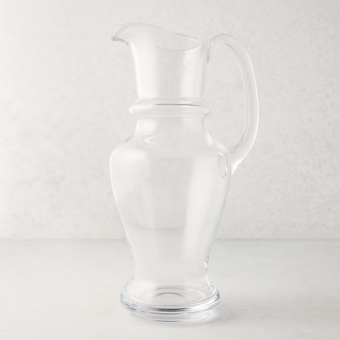 Clear, hand-blown Sutton Glass Pitcher with unique shape and handle, 13"H.