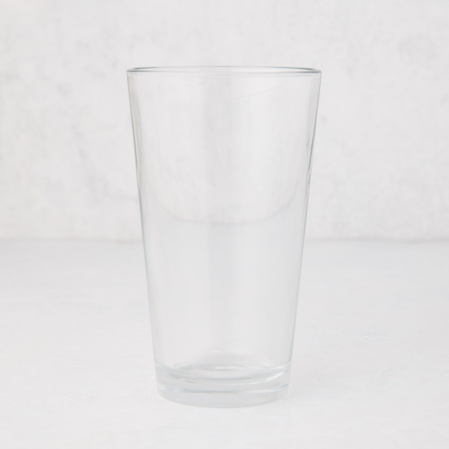 Clear, tall Hudson Grace 12oz drinking glass with thick walls, 6"H.
