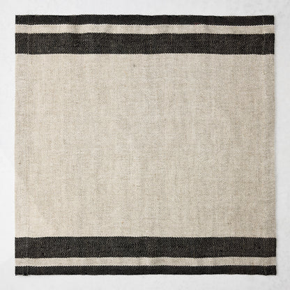 Lexington Charcoal Grey Stripe Border Napkin, 20" square linen/cotton blend, natural base with dark grey stripes.