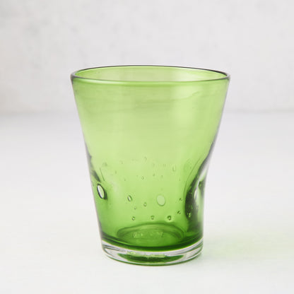 Light green, 8 oz. Henri mouth-blown glass with visible air bubbles and slight asymmetry.