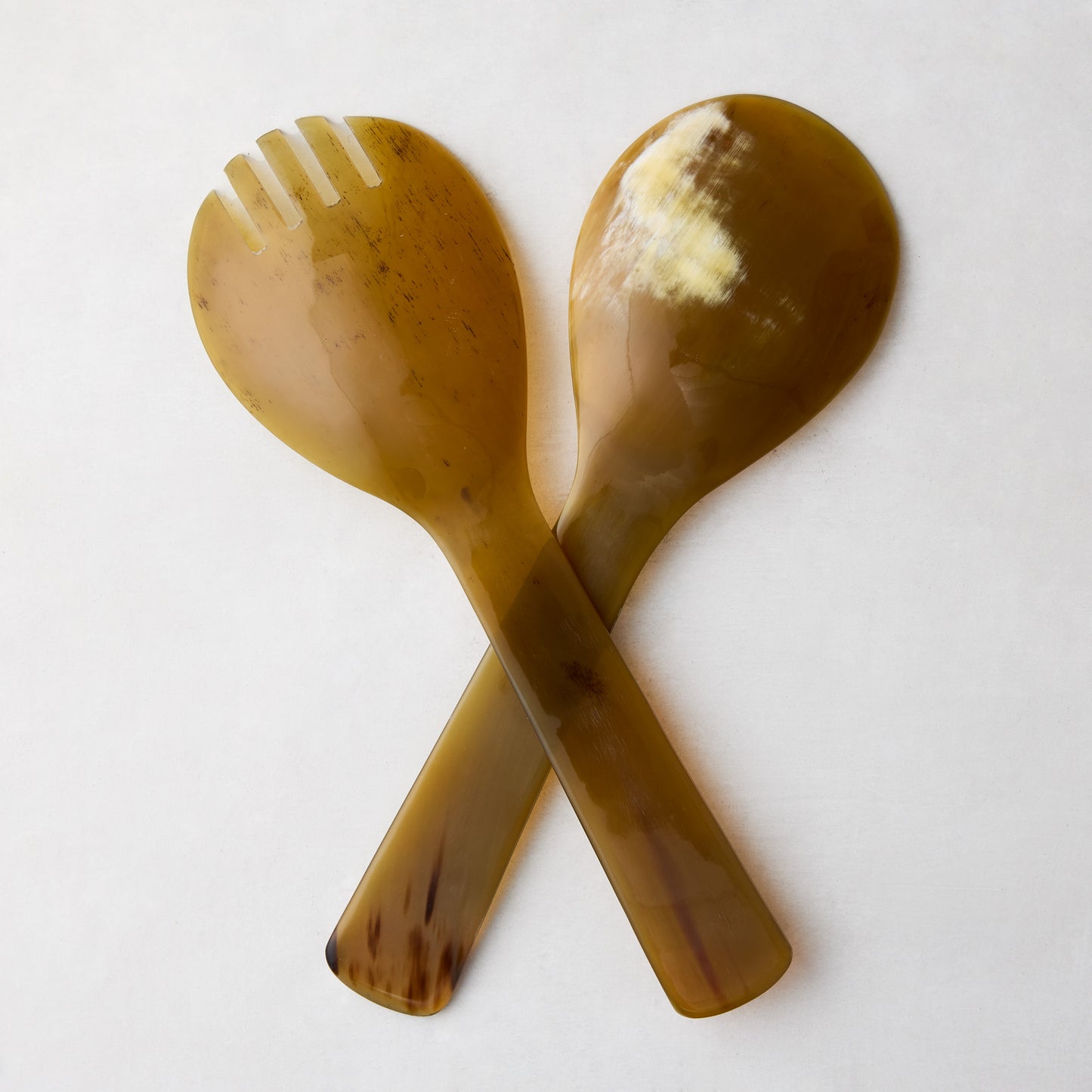 Light Horn Salad Server Set, 12" long, made of natural water buffalo horn with unique grain and color variations.