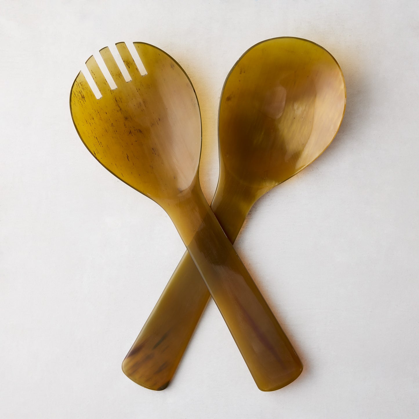 Light Horn Salad Server Set: 12" natural water buffalo horn, one slotted, one solid spoon, crossed.