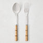 Light Press Wood Bamboo 2-Piece Serving Set: 10.25" L 18/10 stainless steel spoon and fork with natural wood handles.