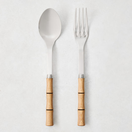 Light Press Wood Bamboo 2-Piece Serving Set: 10.25" L 18/10 stainless steel spoon and fork with natural wood handles.