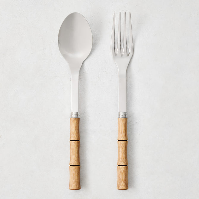 Light Press Wood Bamboo 2-Piece Serving Set: 10.25" L 18/10 stainless steel spoon and fork with natural wood handles.
