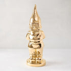 Limited Edition Gold Ceramic Holiday Gnome with brilliant hand-applied gold glaze, designed for modern holiday homes.