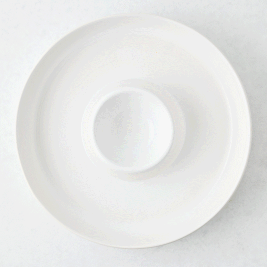 Lisbon stoneware chip and dip bowl in white with a matte exterior and glazed center, 12.6-inch diameter.