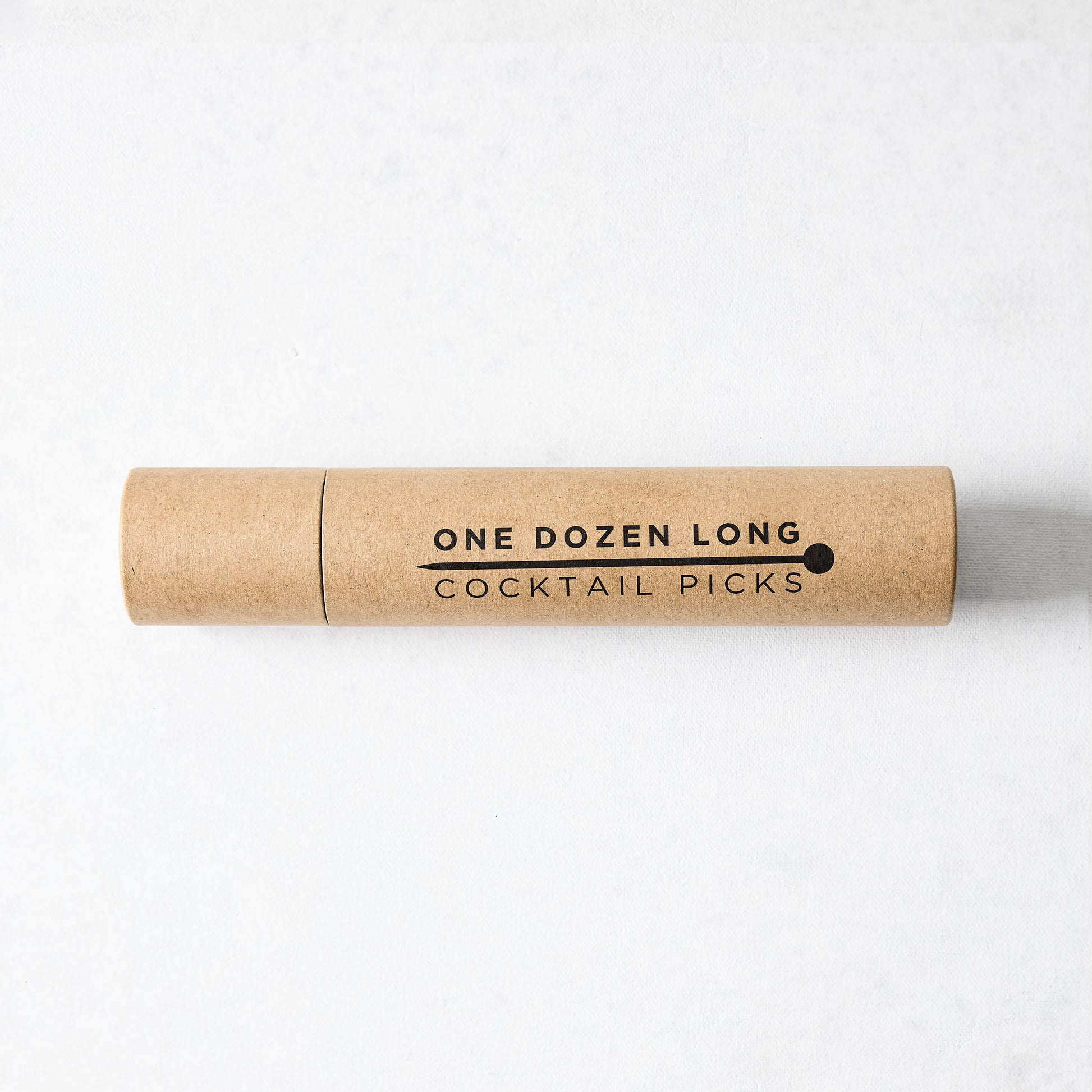Kraft paper tube with "ONE DOZEN LONG COCKTAIL PICKS" in black text and a ball-top pick icon.