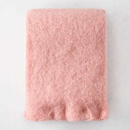 Folded Lotus Pale Pink Solid Mohair Throw Blanket, 72"L x 51"W, with fringed ends.