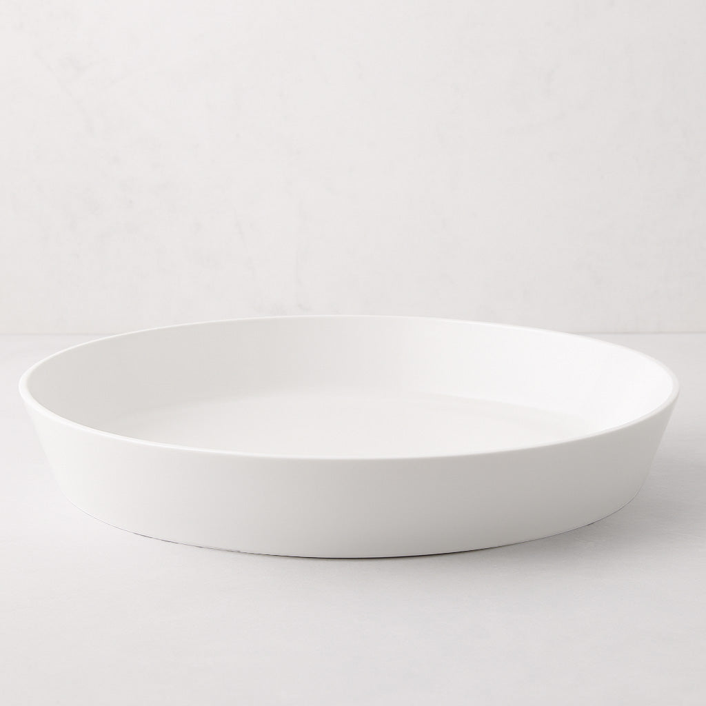 Luce Large white ceramic serving dish, 15" diameter, with a minimalistic, sleek design.