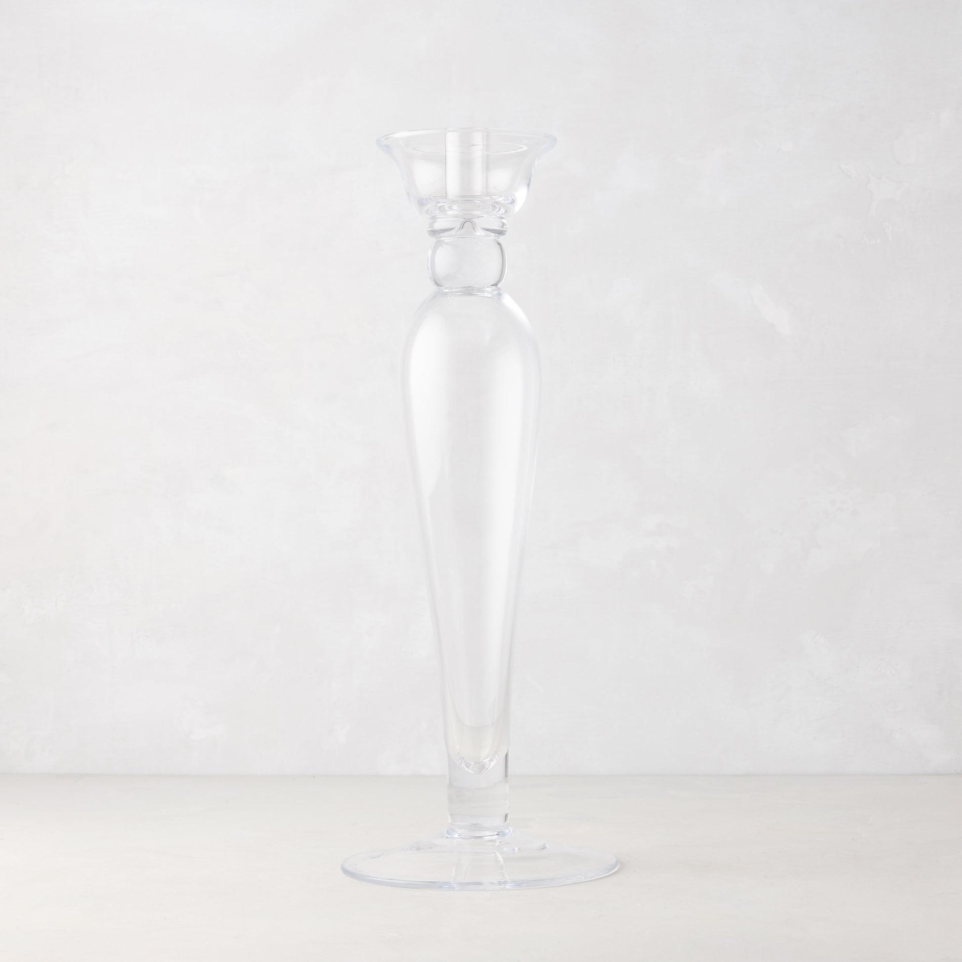 Clear, tall Lumière Glass Single Candlestick with sleek edges, 16"H.