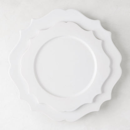White ceramic Lungarno dinner plate with sculptural, scalloped edges, 11" diameter.