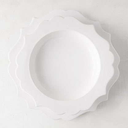 White ceramic Lungarno soup bowl with sculptural, scalloped edges, 9.5" diameter.