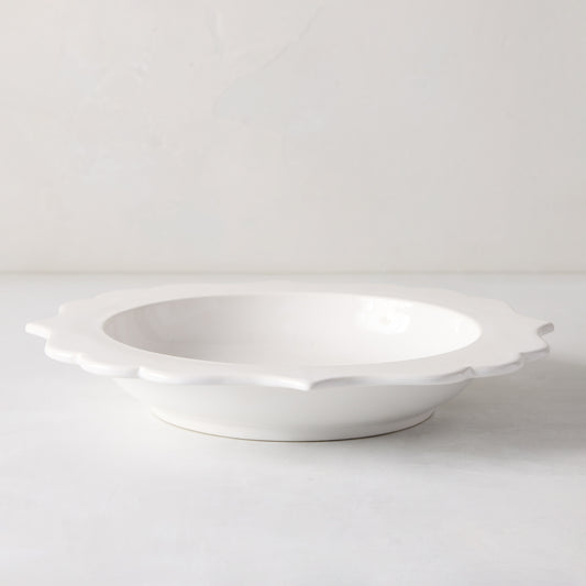 White ceramic Lungarno soup bowl with sculptural, scalloped rim.