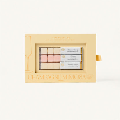 Luxe Champagne Mimosa Mixer Cube Trio: 18 shimmering orange, grapefruit, and lemon flavored cubes in a beige box.