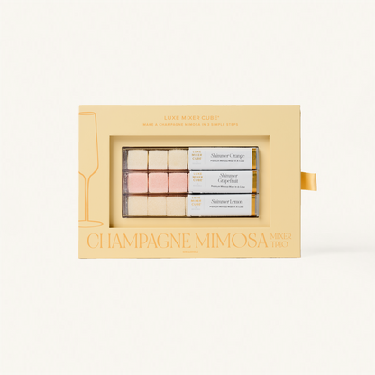 Luxe Champagne Mimosa Mixer Cube Trio: 18 shimmering orange, grapefruit, and lemon flavored cubes in a beige box.