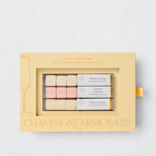 Luxe Champagne Mimosa Mixer Cube Trio: 18 shimmering orange, grapefruit, and lemon cubes in a beige box.