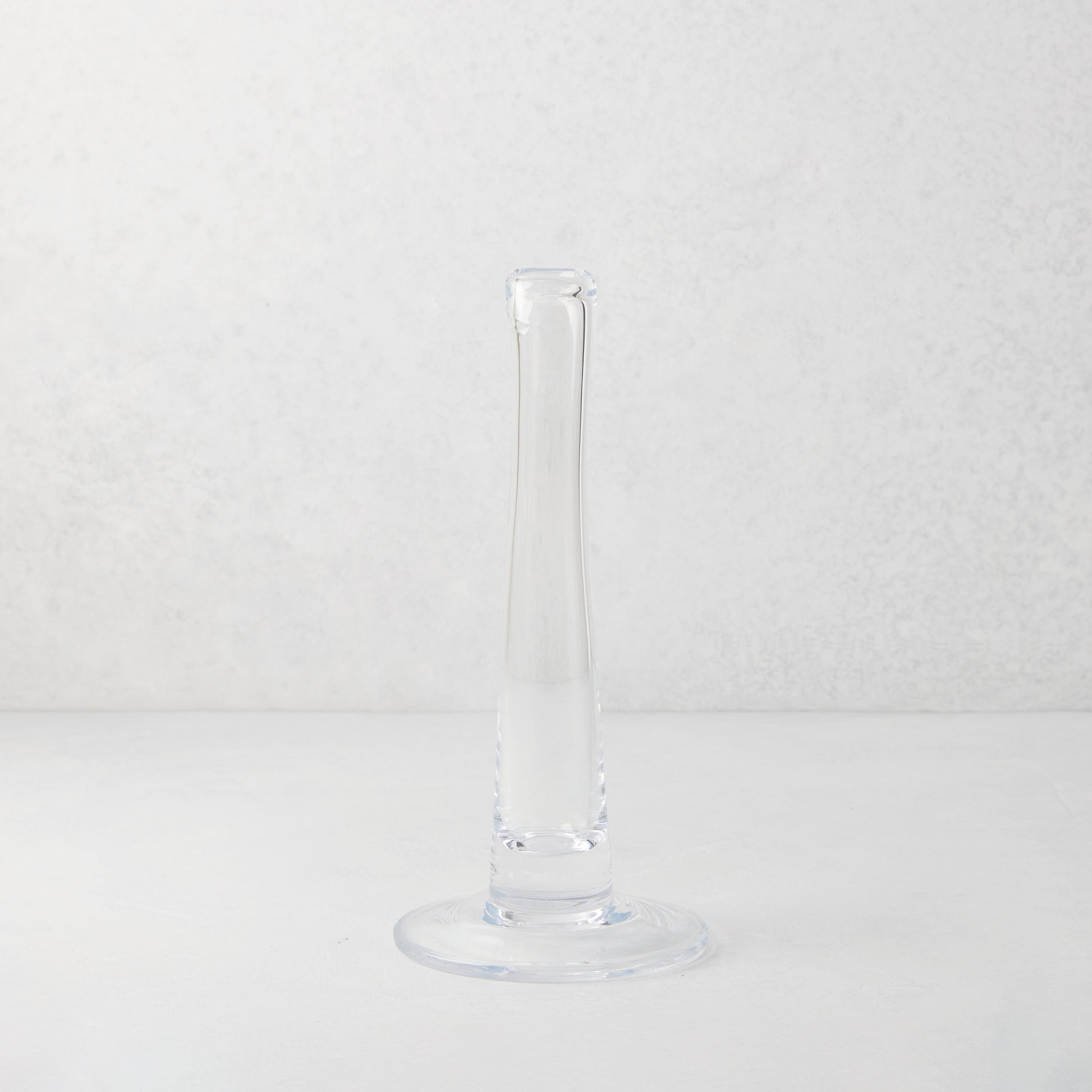 Maddie Small clear scissor-cut glass vase, 12"H, with a modern tube design and wide base.