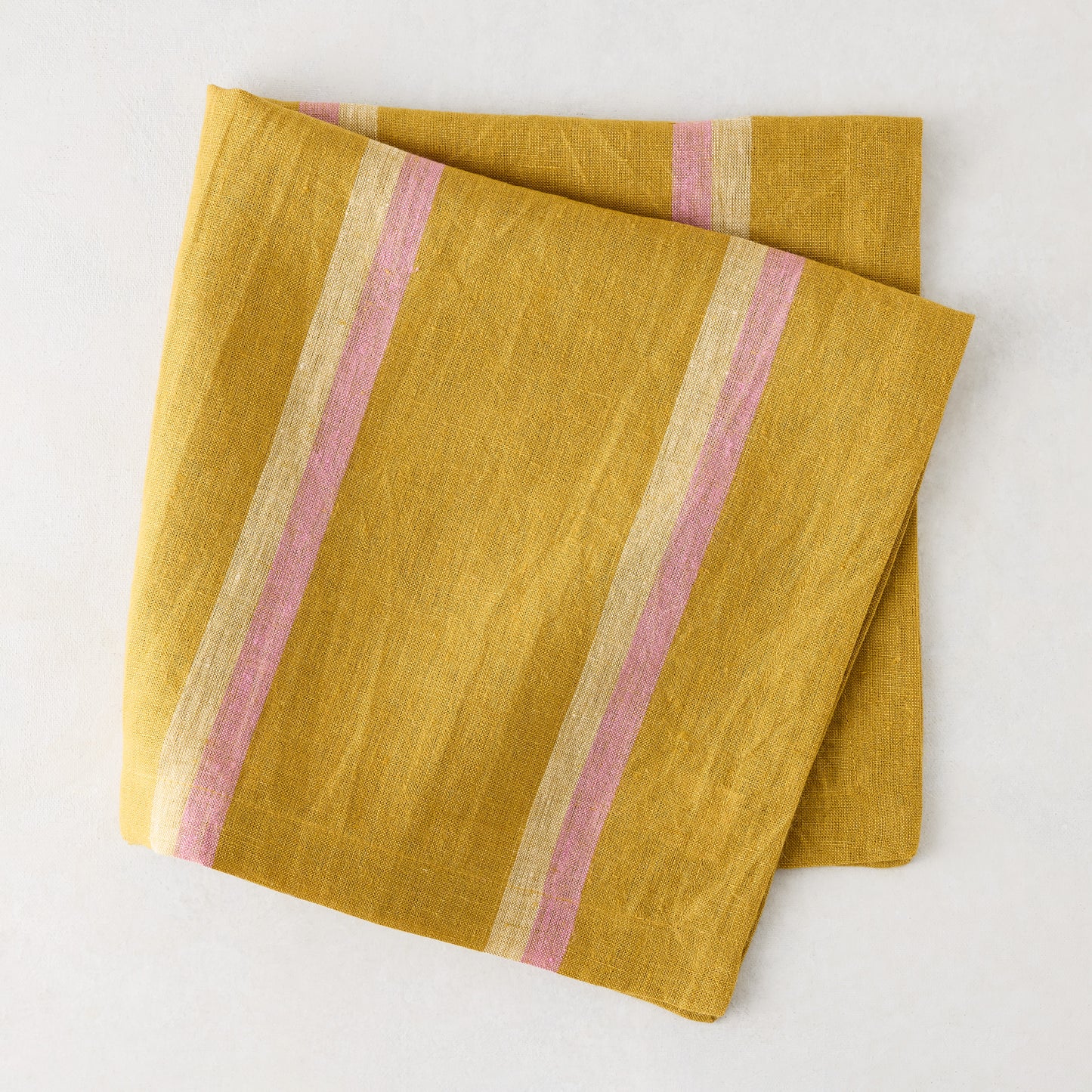 Madras Marigold, Oyster, and Pink Stripe Napkin, 100% washed cotton, 22" square.