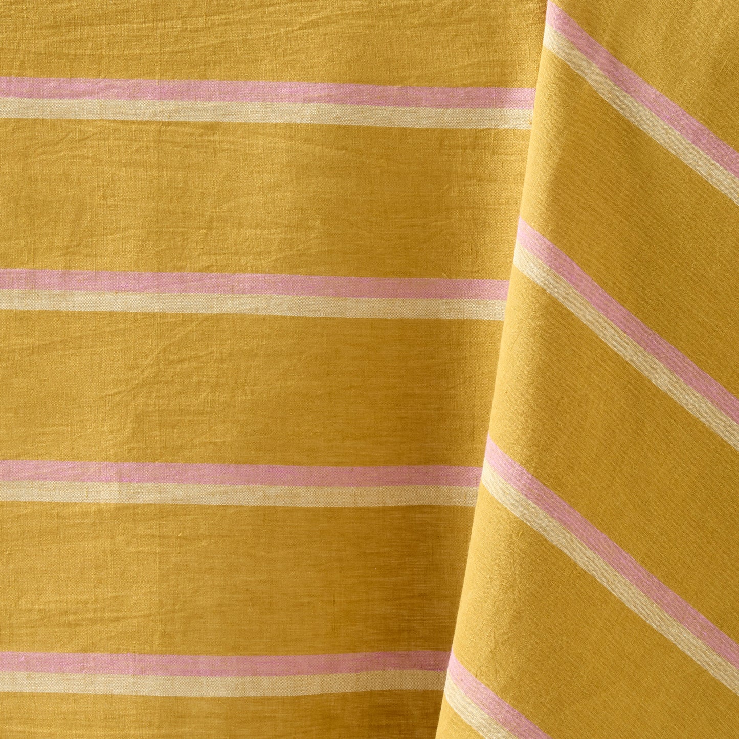 Madras Marigold, Pink, and Natural Stripe Cotton Tablecloth, 70"W x 108"L.