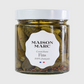 Maison Marc Cornichons Fins in a clear glass jar with a white lid and label, showing green pickles and spices.