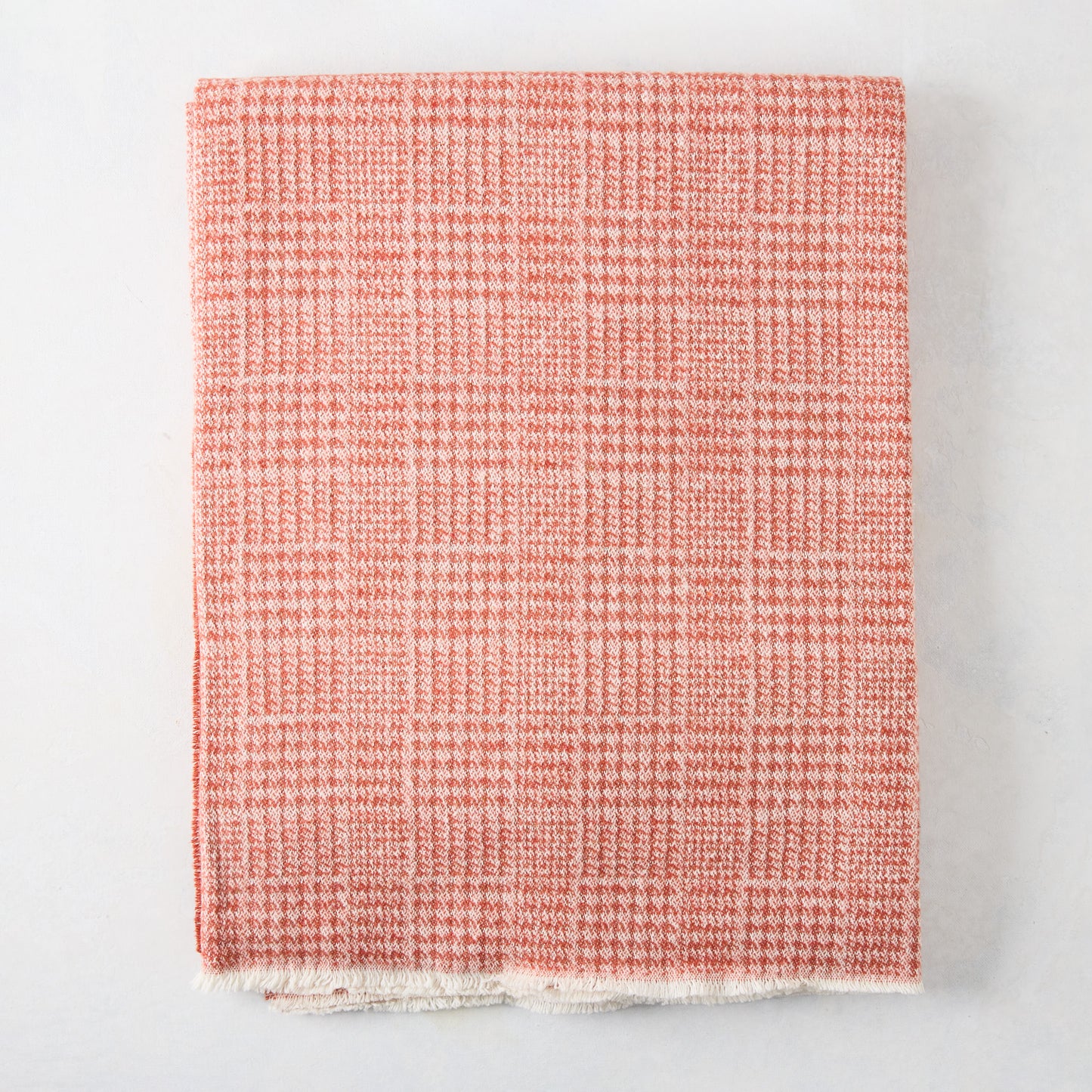 Mandarin orange Sutton Houndstooth throw blanket, 51"x67", cotton-acrylic blend, raw edge.