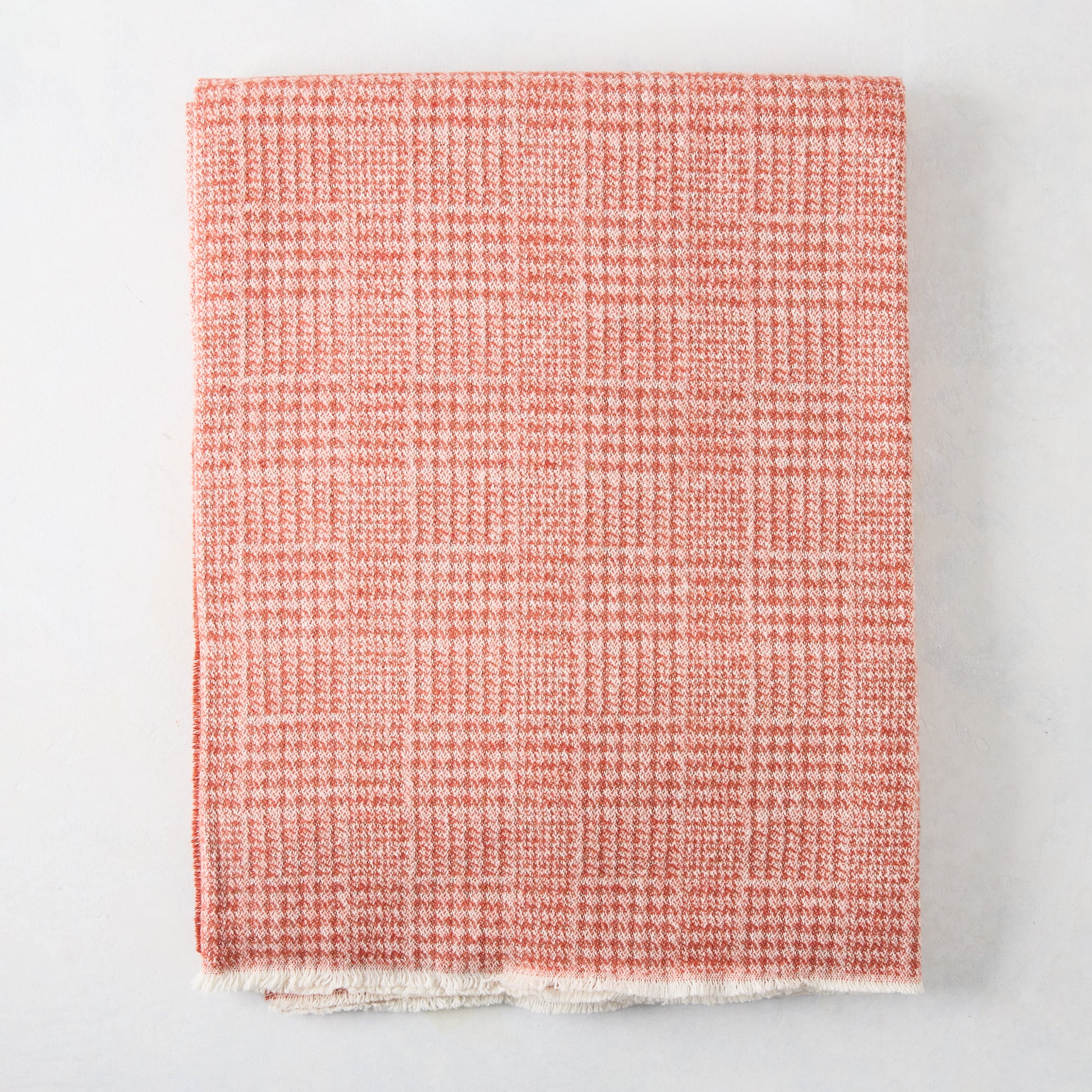 Mandarin orange Sutton Houndstooth throw blanket, 51"x67", cotton-acrylic blend, raw edge.