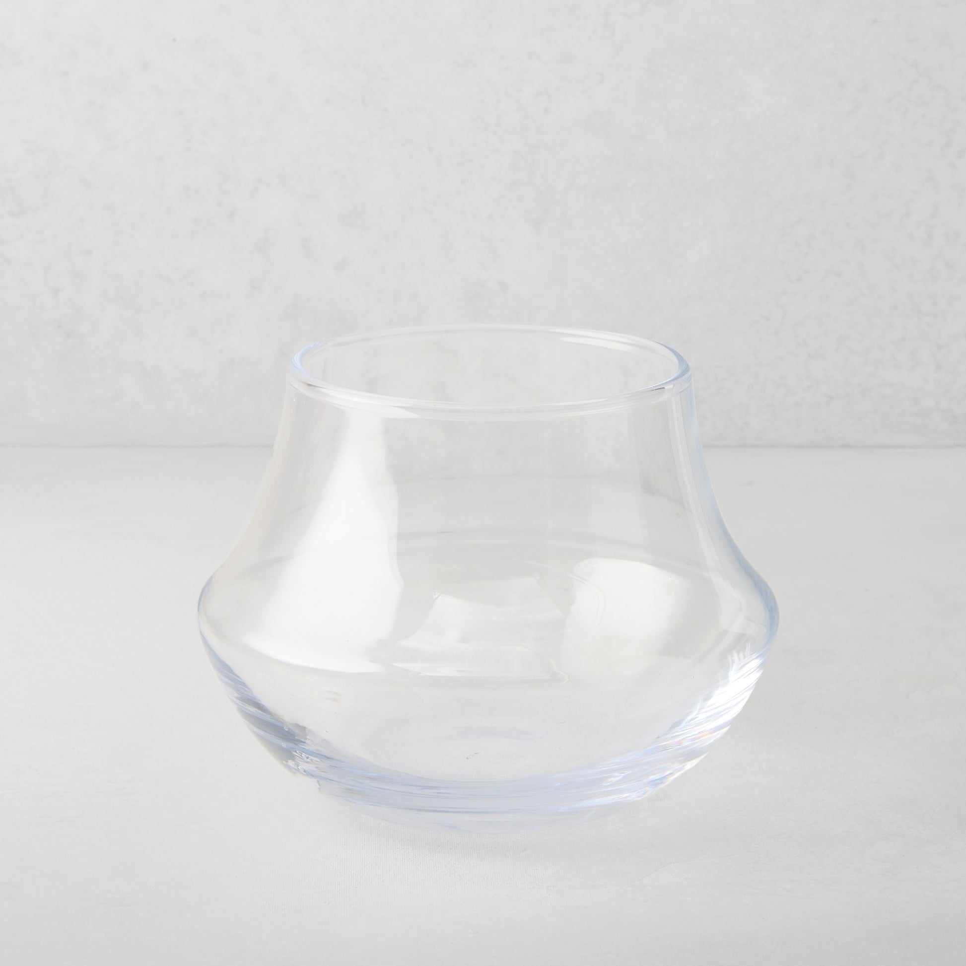 Clear, mouth-blown glass Mario vase, 5.5"W x 7.1"H, with a traditional silhouette.