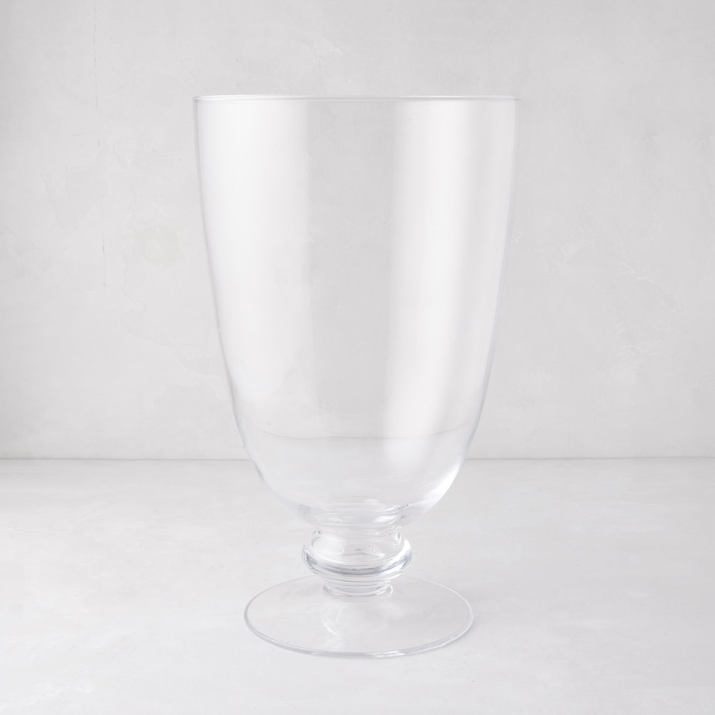 Mayfair Medium Glass Hurricane, clear, 18"H, with a decorative base.