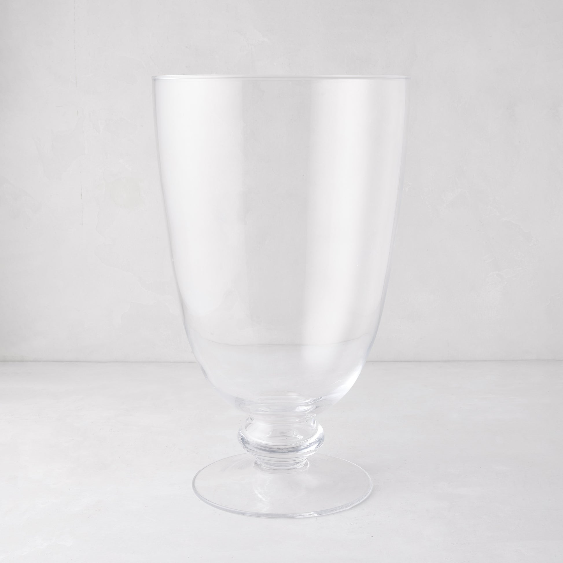 Mayfair Medium Glass Hurricane, clear, 18"H, with a decorative base.