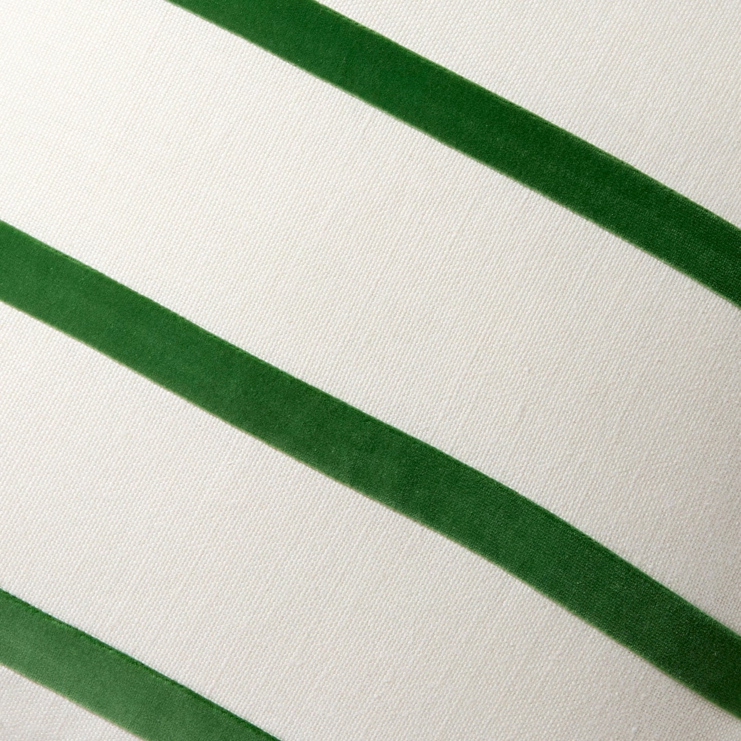 Meadow green velvet stripes on an ivory linen pillow, 22" square.