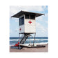 Matt Albiani Medic Lifeguard Tower photograph: white tower with red crosses on a sandy beach.