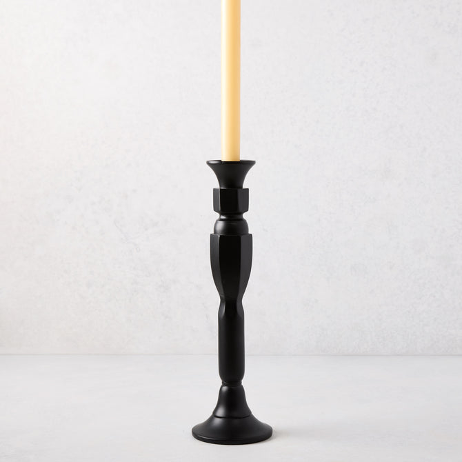 Medium black lacquer Georgian candlestick, hand-carved beechwood, 13"H, with a cream taper candle.