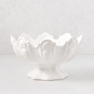 White ceramic scallop serve bowl with decorative base.