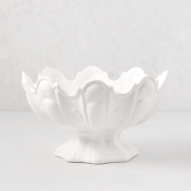 White ceramic scallop serve bowl with decorative base.