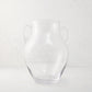 Medium clear recycled glass confit vase with organic curves and decorative handles.