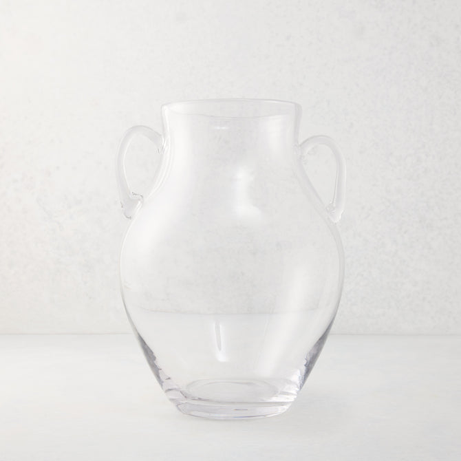 Medium clear recycled glass confit vase with organic curves and decorative handles.