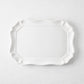 Medium 14-inch white ceramic Torcello serve platter with a scalloped edge, made in Italy.