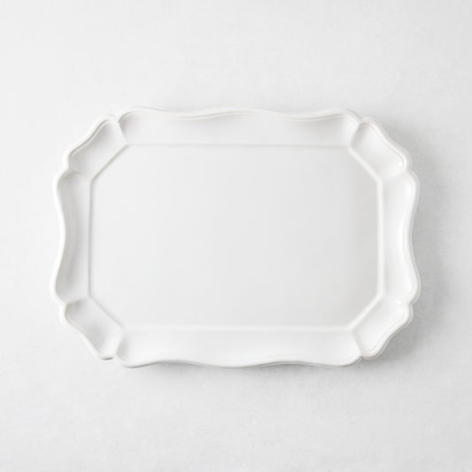 Medium 14-inch white ceramic Torcello serve platter with a scalloped edge, made in Italy.