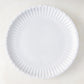 White 10.5" Melamine Street Eats dinner plate with a fluted edge, mimicking a paper plate.