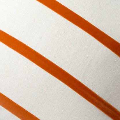 Melon orange velvet stripes on an ivory linen square pillow.