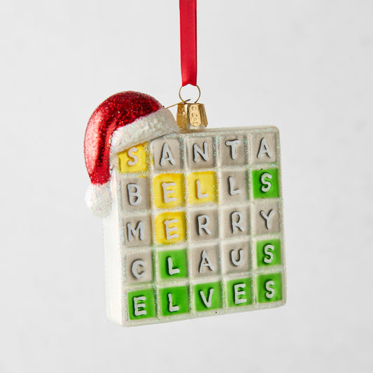 Merry Words Christmas tree ornament, a white glass square with colorful letter tiles and a red glitter Santa hat.