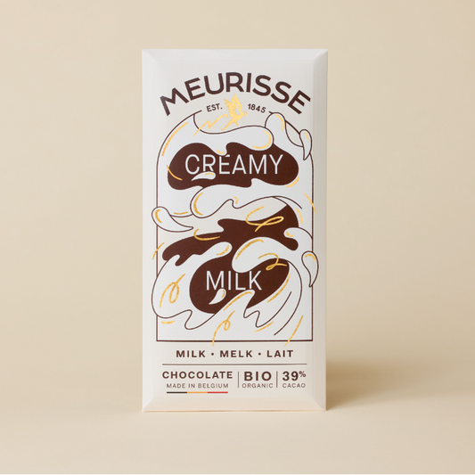 Meurisse Creamy Milk Chocolate Bar, white packaging with brown and gold wavy design.