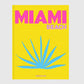 Hudson Grace Miami Beach coffee table book with a bright yellow cover, pink text, and blue palm leaf illustration.