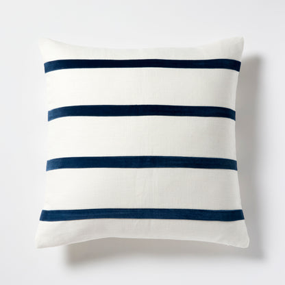 Ivory Belgian Linen pillow with three horizontal Midnight Blue velvet stripes.