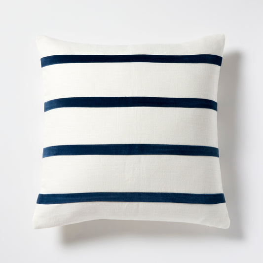 Ivory Belgian Linen pillow with three horizontal Midnight Blue velvet stripes.