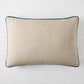Linen lumbar pillow with midnight blue velvet gusset, 20"L x 14"H.