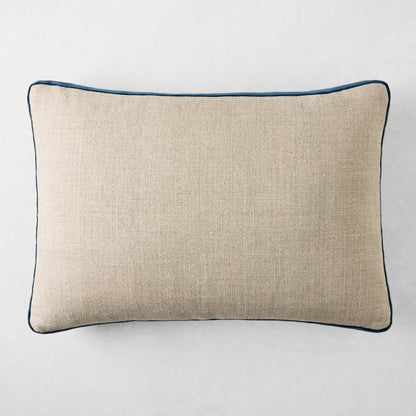 Linen lumbar pillow with midnight blue velvet gusset, 20"L x 14"H.