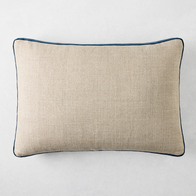 Linen lumbar pillow with midnight blue velvet gusset, 20"L x 14"H.